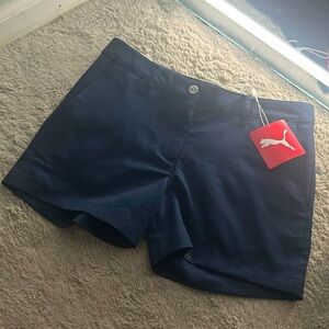 selling a new pair of Puma khaki shorts, color is navy blue!